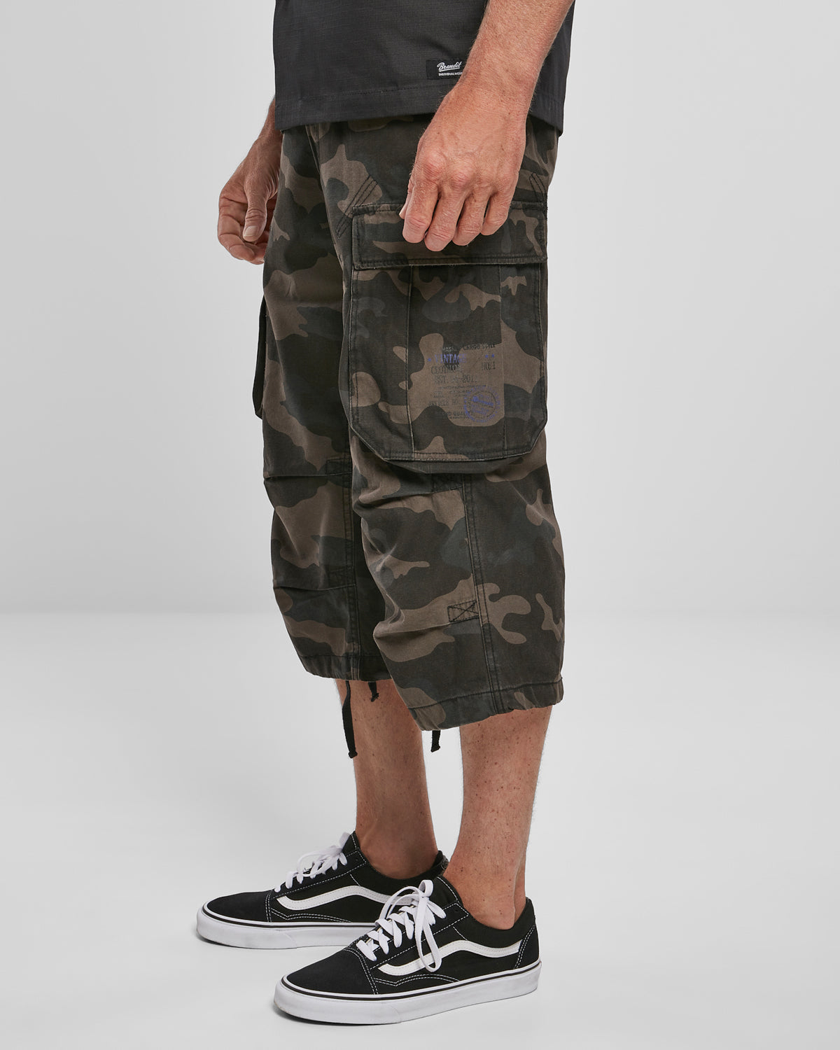 Brandit Industry 3/4 reisitaskushortsit - Tumma Camo